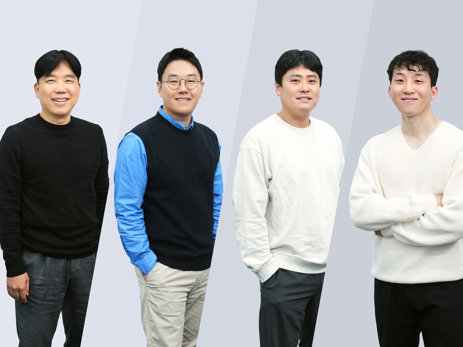 Four PM9E1 development team engineers from Samsung Semiconductor posing for a group photo, representing key contributors to the compact PCIe Gen5 NVMe SSD innovation.