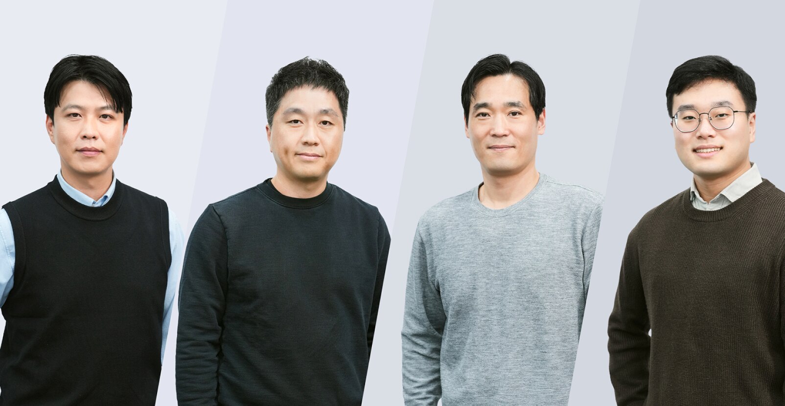 Four engineers who contributed to the development of LPDDR6 low-power DRAM stand together wearing neutral-tone sweaters against a soft gradient backdrop.