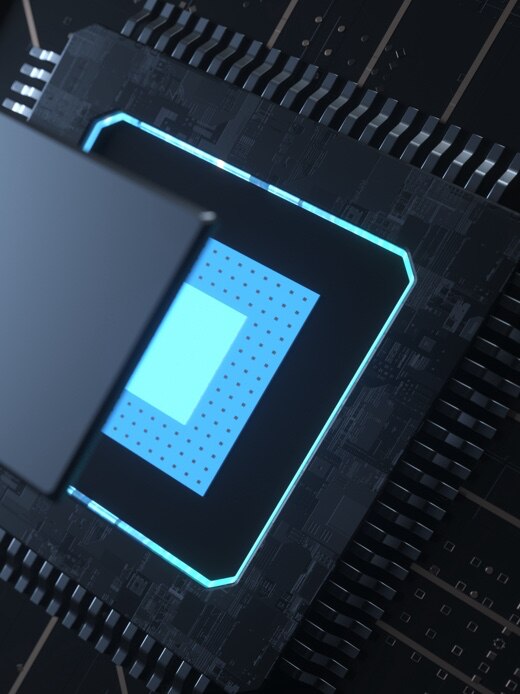 系统半导体的放大图，发出蓝光，采用 3D 堆叠封装技术“X-Cube”。